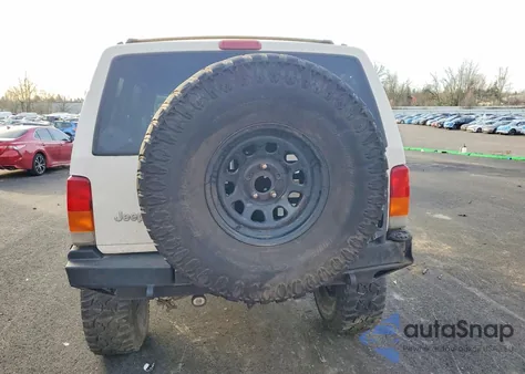 1999 Jeep Cherokee Sport z USA, uszkodzony, nr VIN 1J4FF68S7XL573353